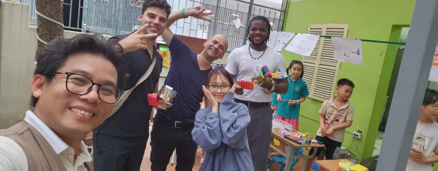Teachers and students together at an HEC community event