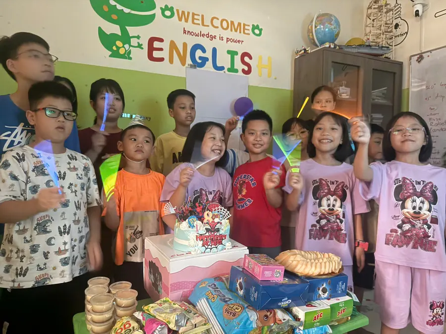 Students celebrating together in the HEC classroom
